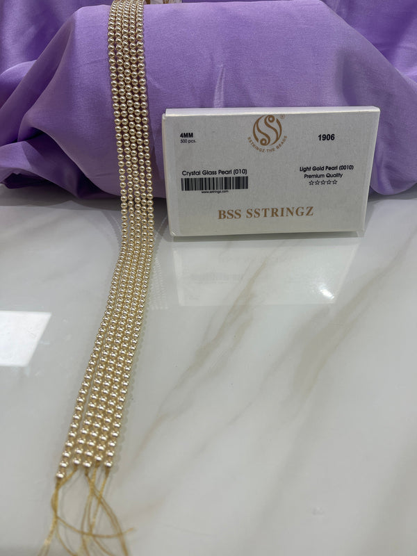 BSS SSTRINGZ LIGHT GOLD PEARL  4MM